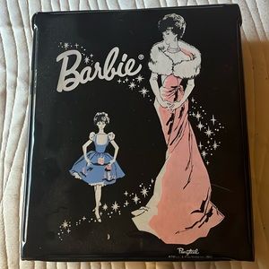 Vintage 1962 Barbie storage case in black.